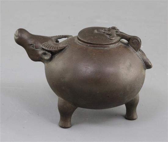 A Chinese bronze tripod ox-head tripod vessel or water dropper, 17th/18th century, 10.5cm long